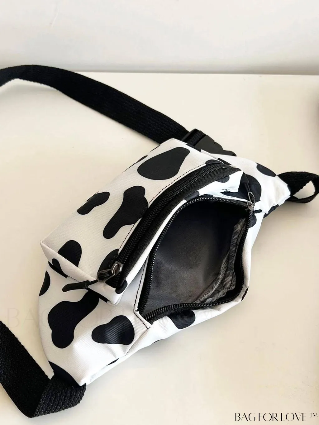 BagForLove - Stylish Adjustable Strap Cow Print Fanny Pack - Fashion-forward and Versatile