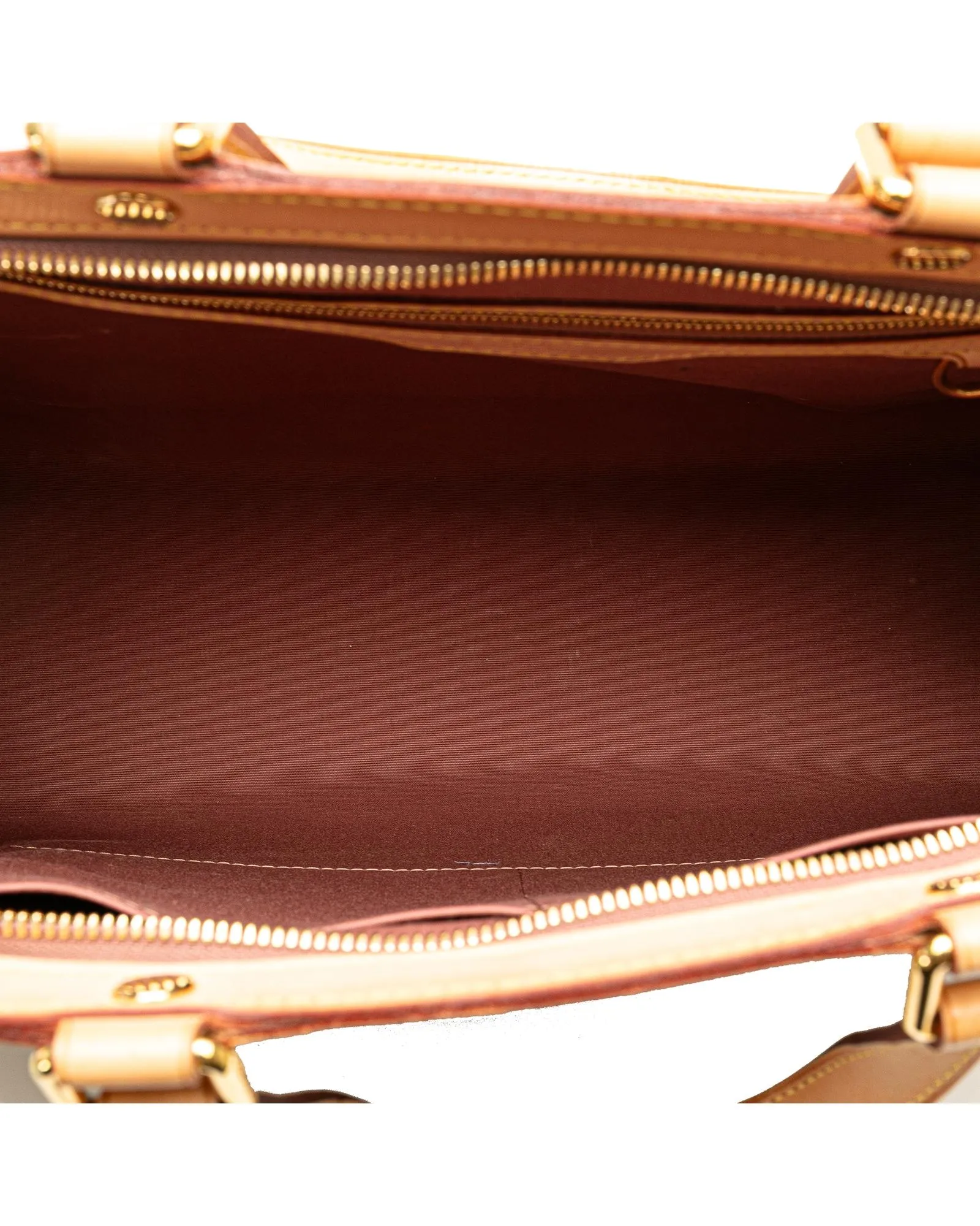 Monogram Vernis Leather Handbag with Vachetta Trim and Detachable Strap
