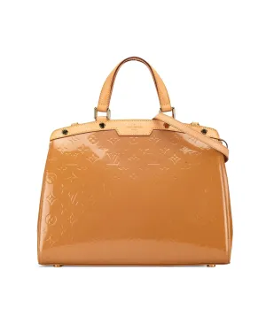Monogram Vernis Leather Handbag with Vachetta Trim and Detachable Strap